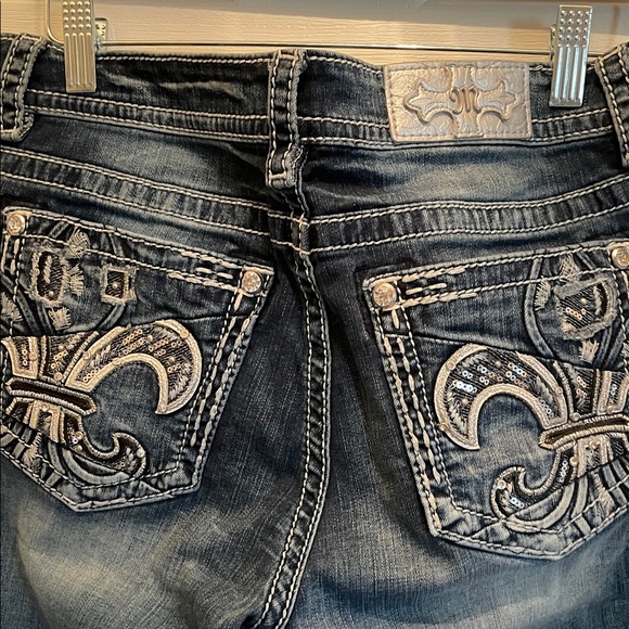 Embellished  Miss Me Women's Dark Wash Jeans with Decorative Back Pockets